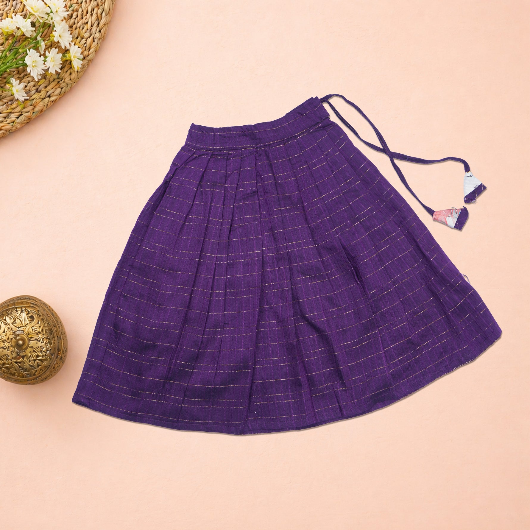 Girls abstract printed ethnic top and purple pleated skirt set by Boon Babies, featuring vibrant patterns and comfortable fabric.