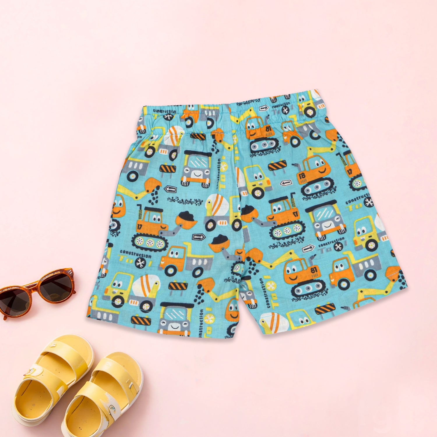 Printed boys co-ord set with aqua truck print, includes Chinese collar shirt and matching shorts by Boon Babies.