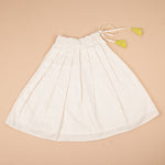 Soft silk sleeveless top and flared skirt set for girls with a classic ethnic look, ideal for festive and outdoor wear.
