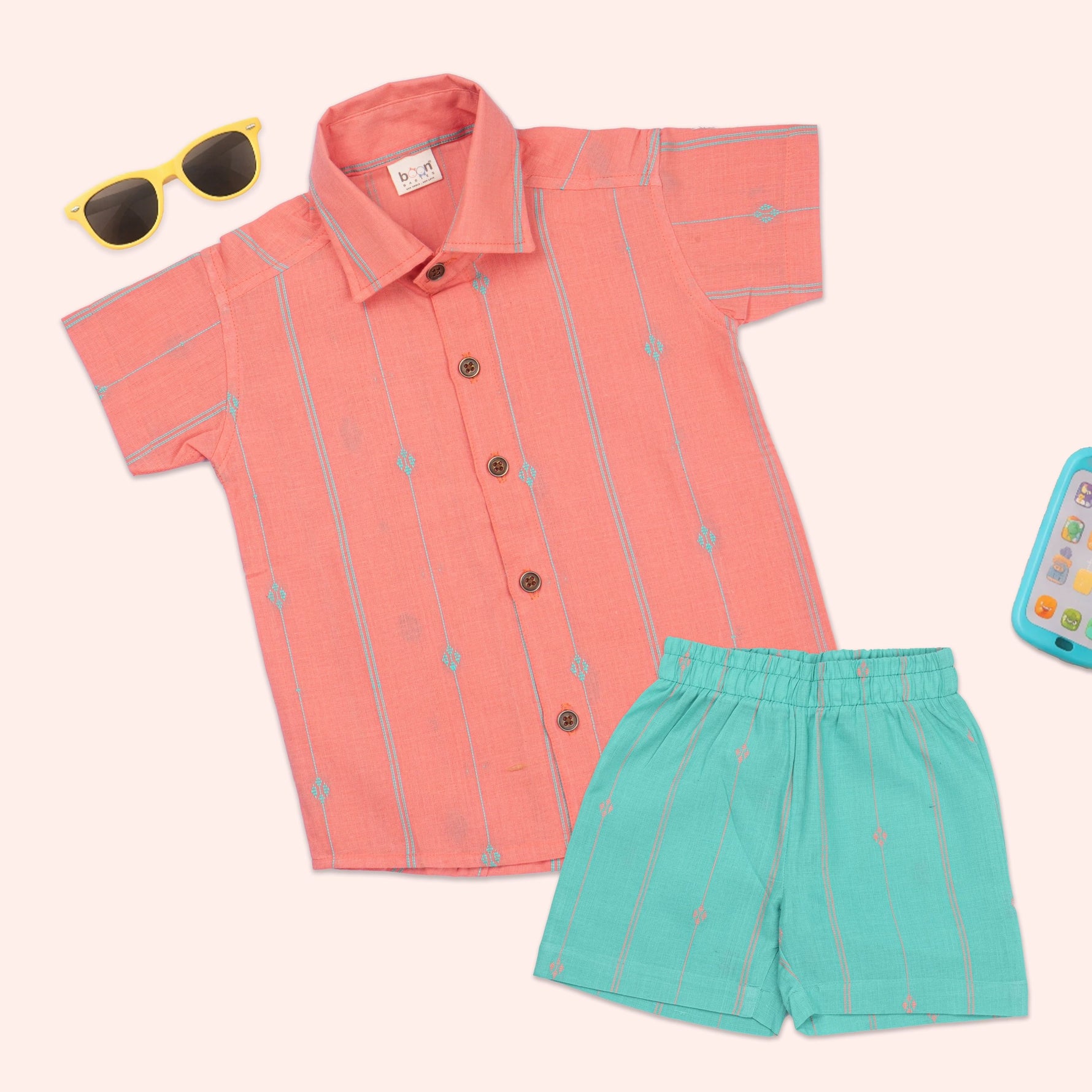 Boys coral handloom cotton printed shirt with straight collar paired with mint shorts co-ord set, perfect for casual summer wear.