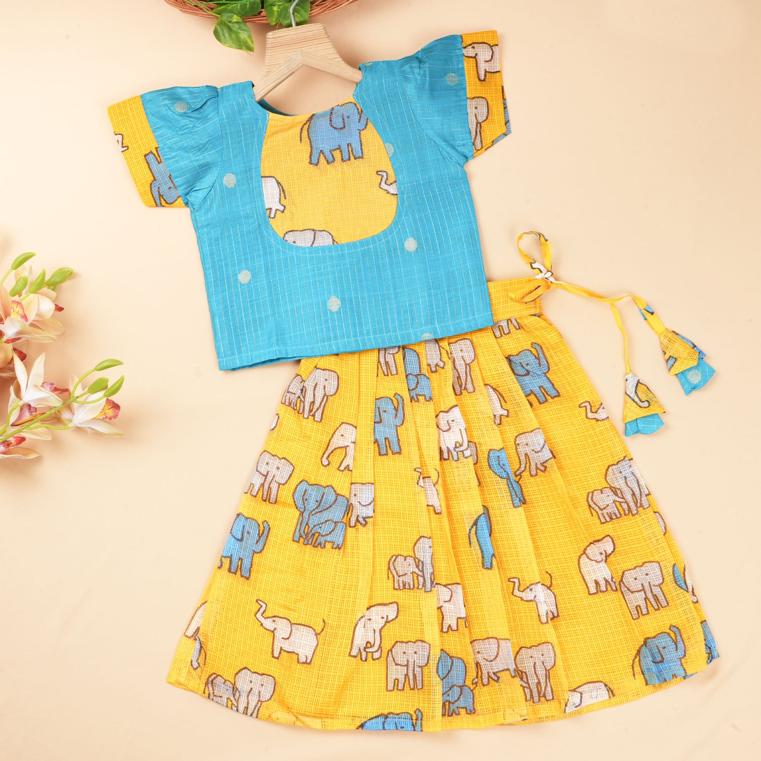 Boon Babies ethnic top and skirt set for babies featuring an elephant charm design, colorful and traditional clothing for infants.
