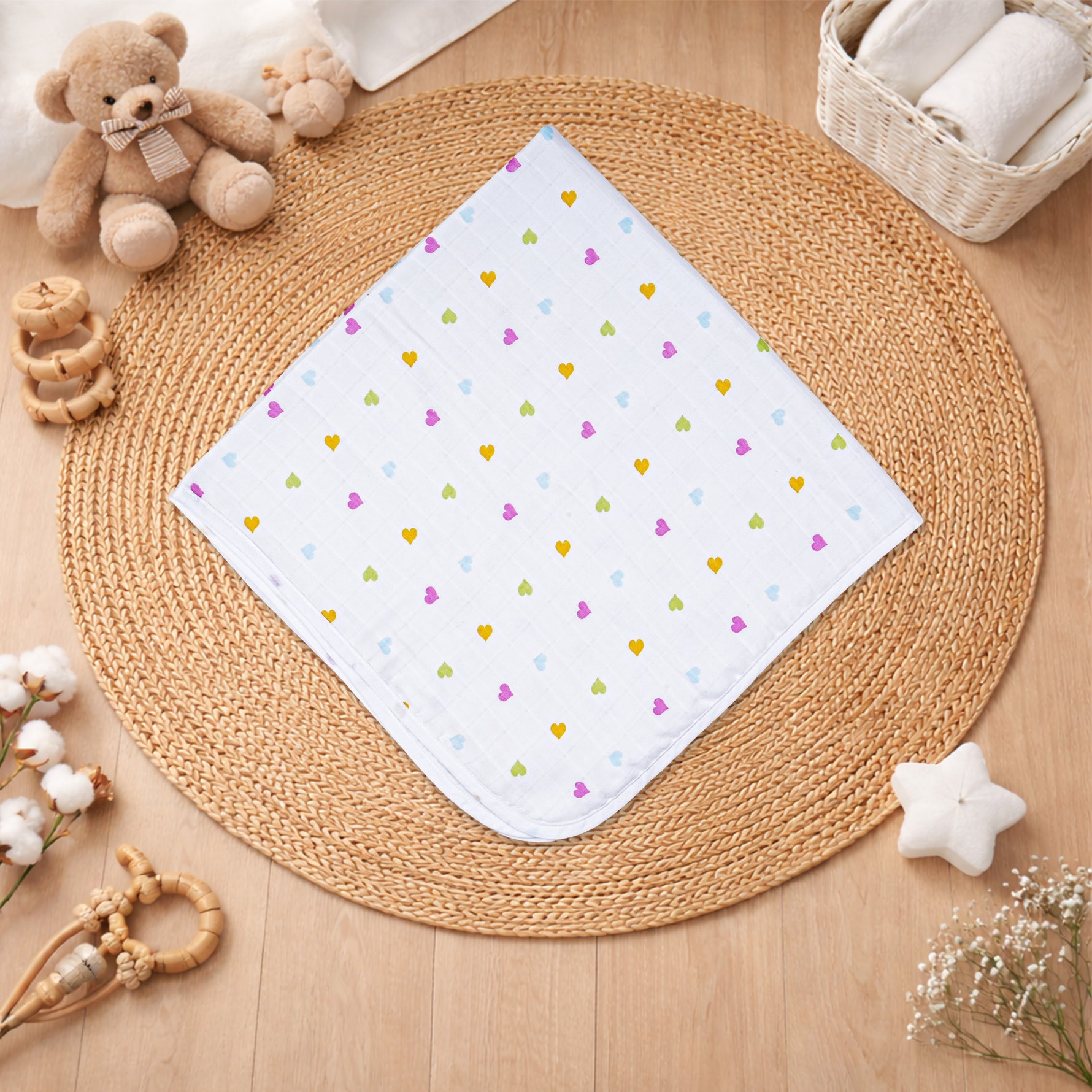 Boonbabies printed 2-layer muslin hooded baby towel with soft fabric and cute print, measuring 70x70 cm for newborns.