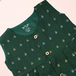 Green ethnic sleeveless frock for baby girls by Boon Babies, featuring traditional embroidery and comfortable fabric.