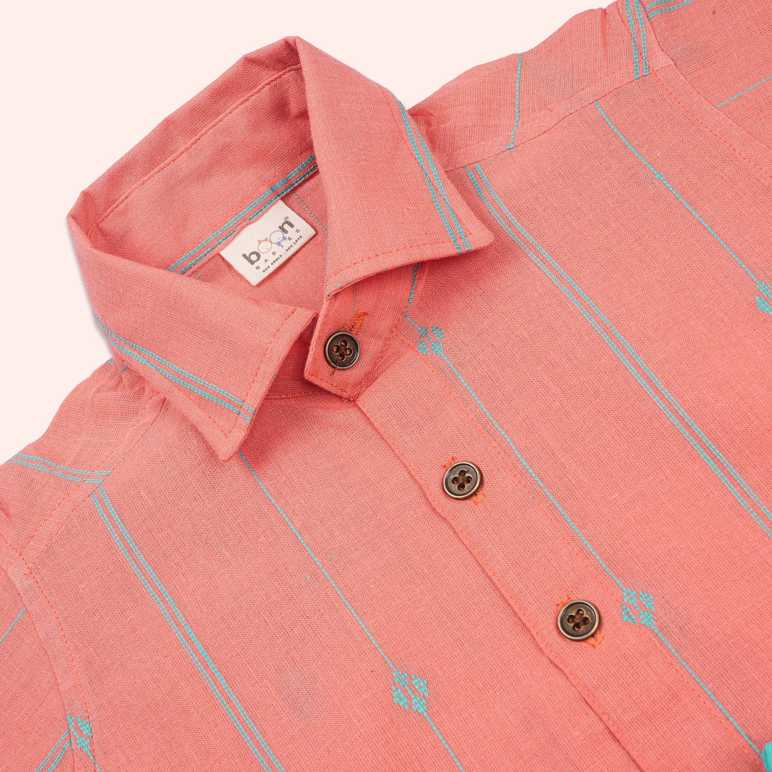 Boys coral printed handloom cotton straight collar shirt and mint shorts co-ord set by Boon Babies, casual summer outfit for boys.