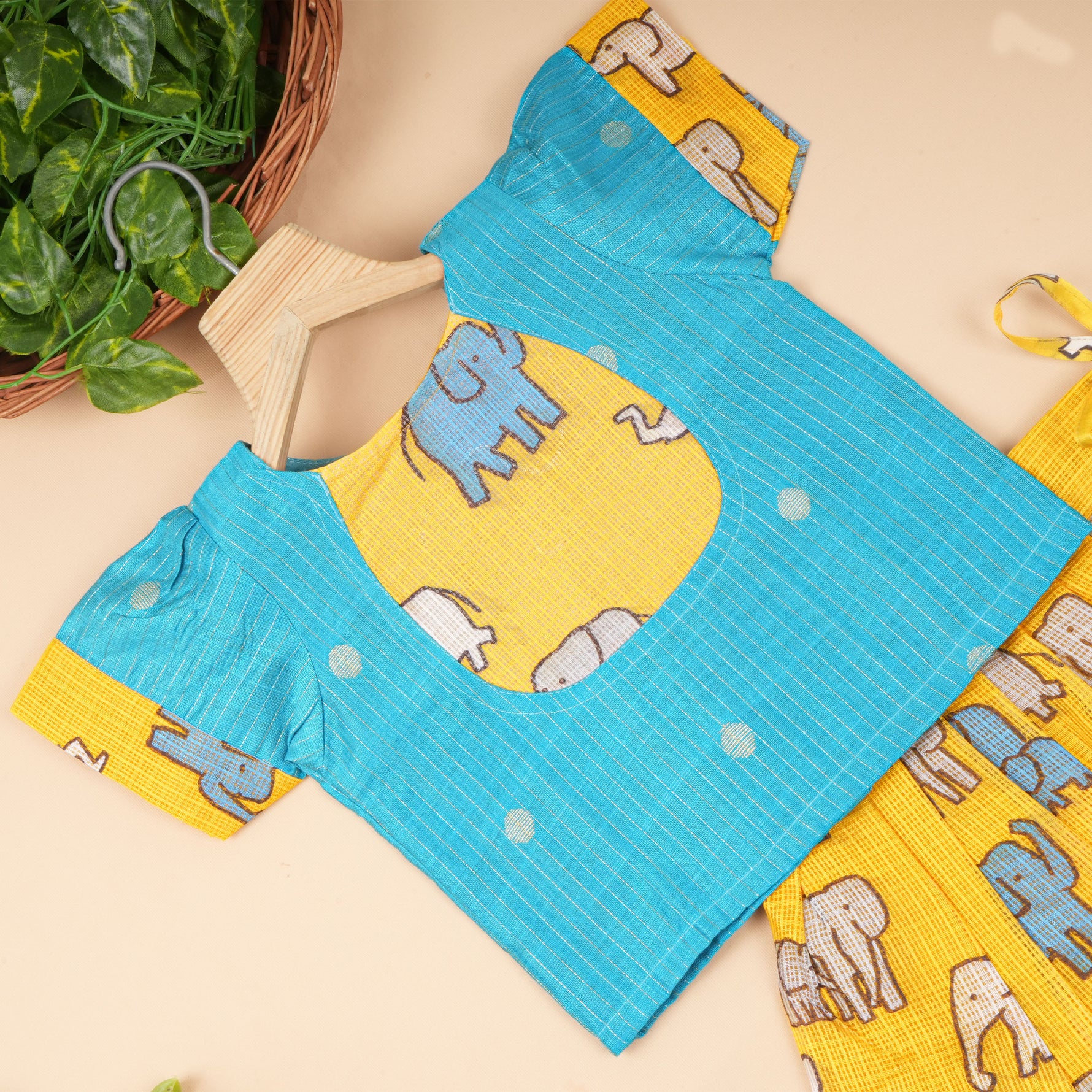 Boonbabies Elephant Charm ethnic top and skirt set for babies, featuring colorful fabric and playful elephant details.