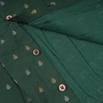 Green ethnic sleeveless frock for baby girls by Boon Babies, featuring traditional design and soft fabric for comfortable wear.