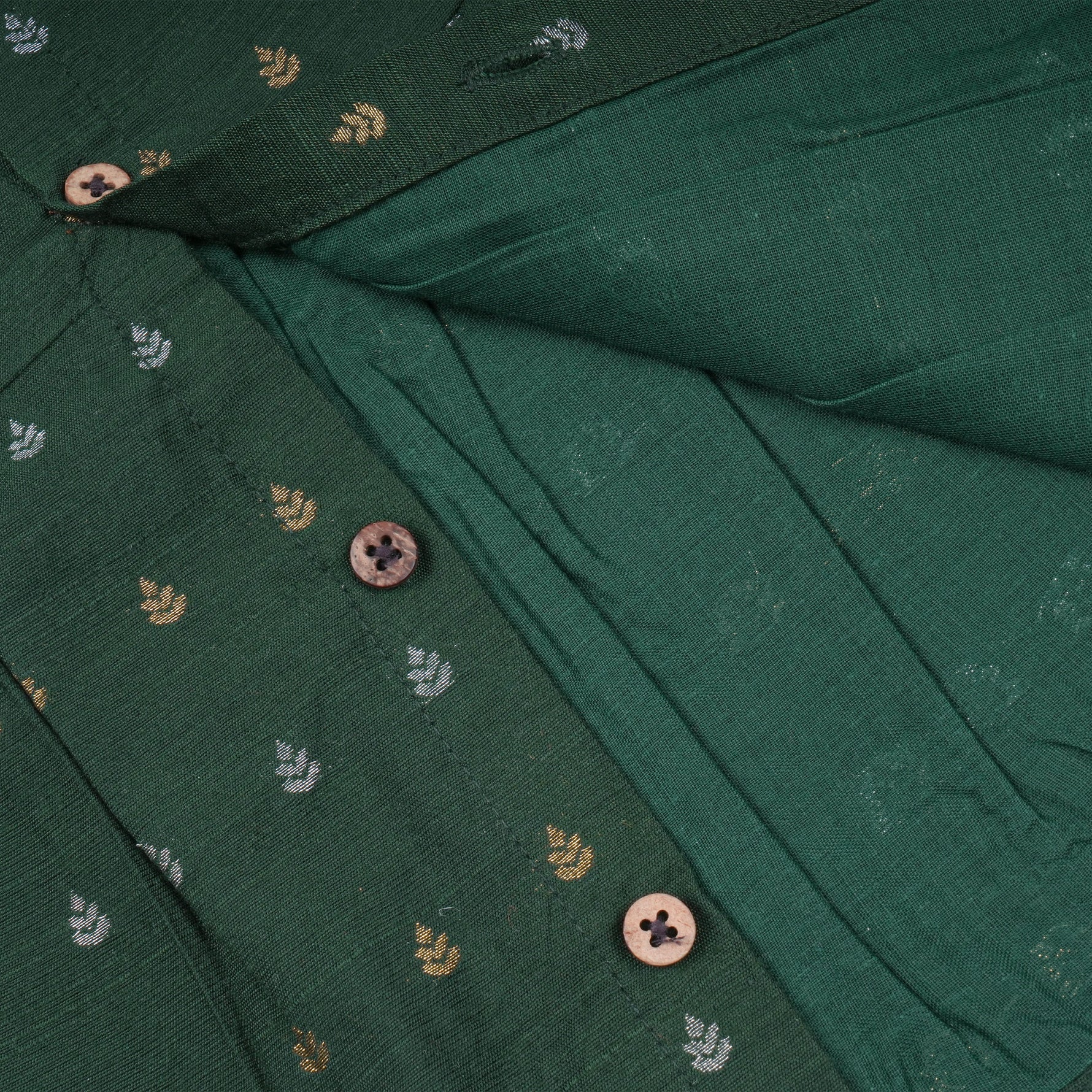 Green ethnic sleeveless frock for baby girls by Boon Babies, featuring traditional design and soft fabric for comfortable wear.