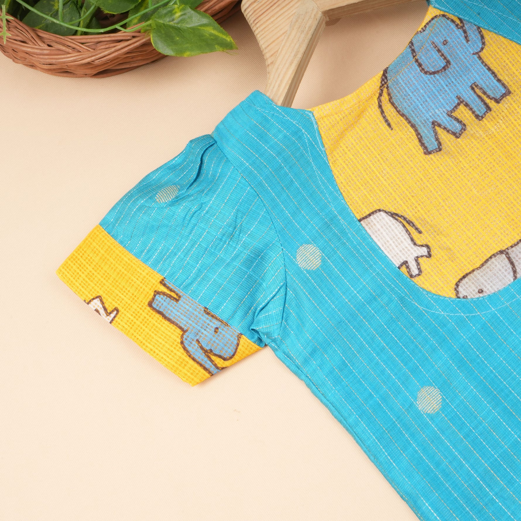 Boonbabies Elephant Charm ethnic top and skirt set for babies, featuring colorful fabric and playful elephant details.