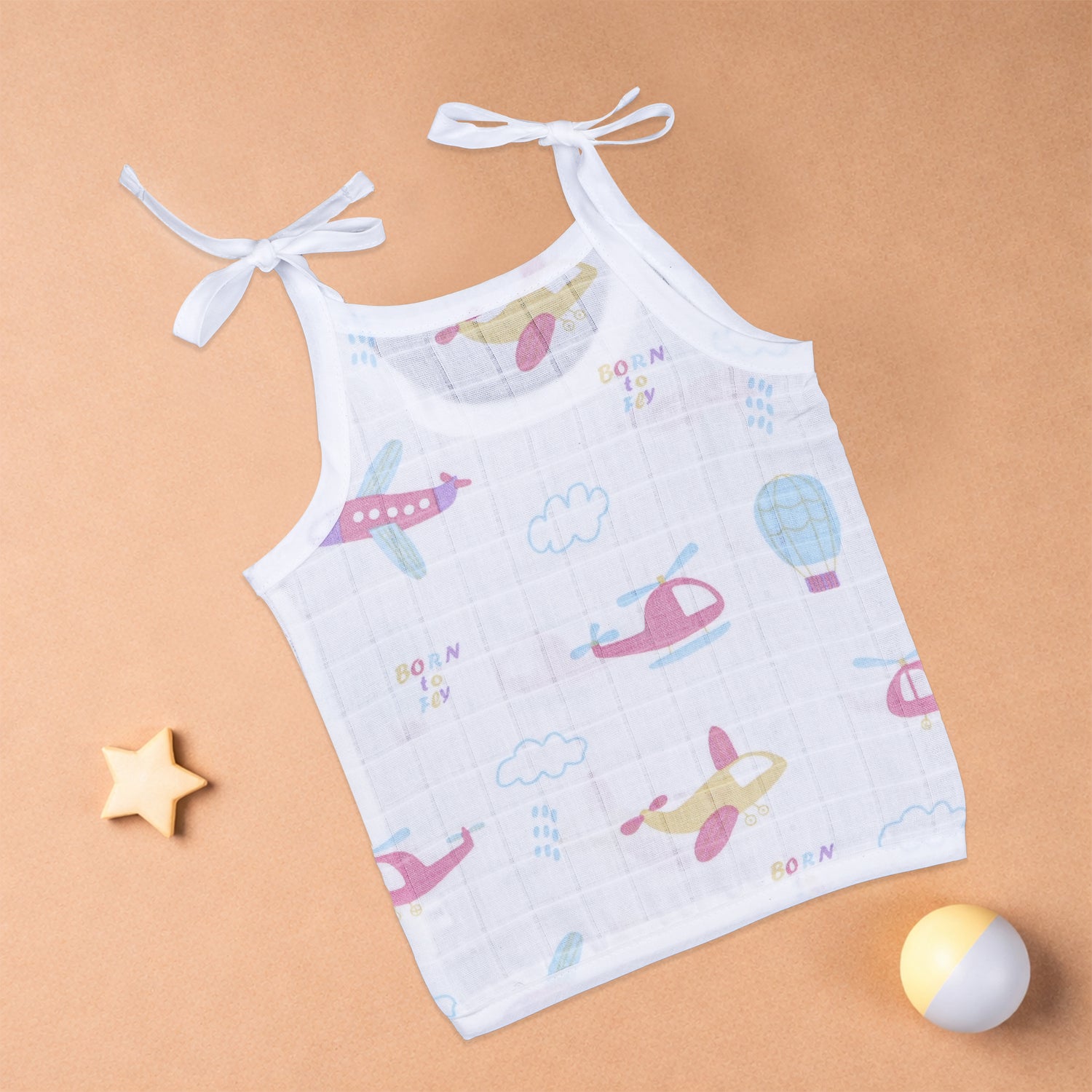 Boonbabies muslin knot jabla for babies, soft printed tie-up baby top in lightweight fabric for infants aged 0-6 months.