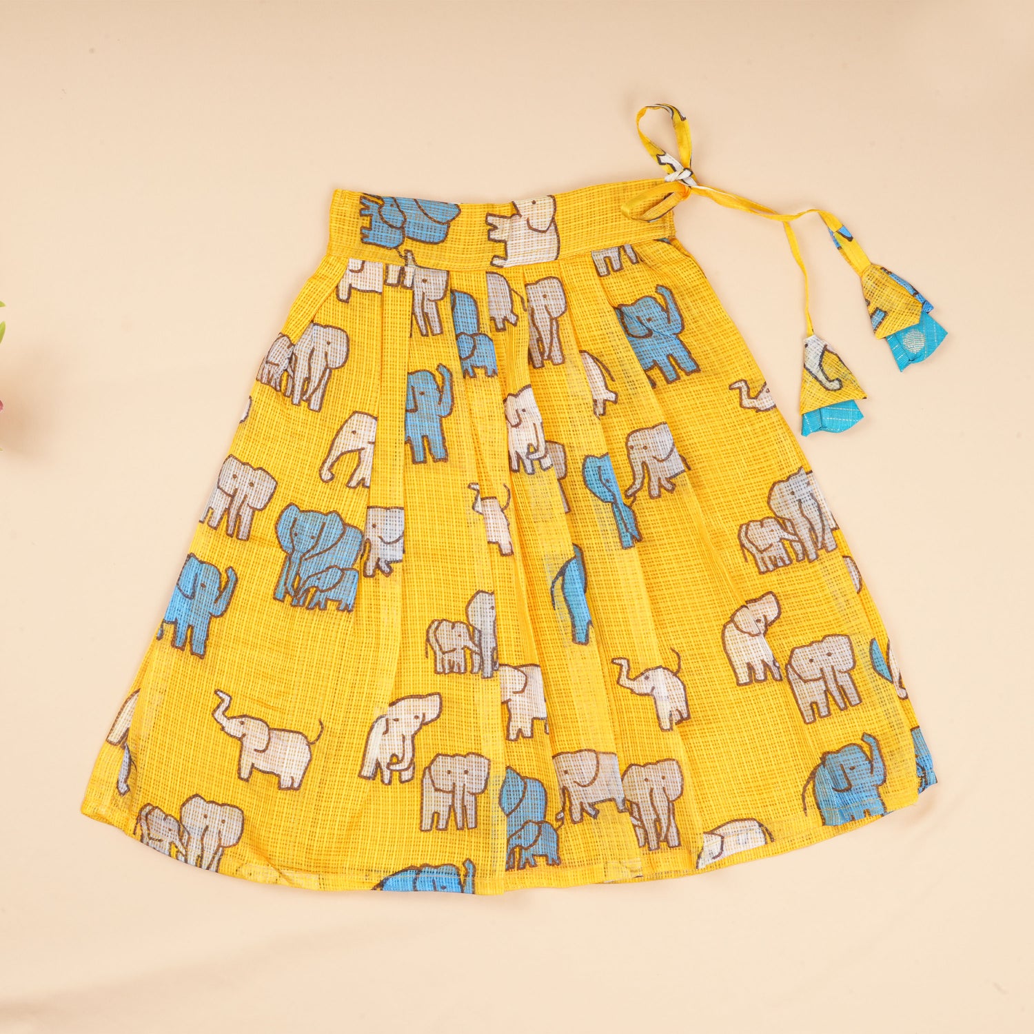 Boon Babies Ethnic top and skirt set for babies featuring a cute elephant charm design in colorful fabrics.