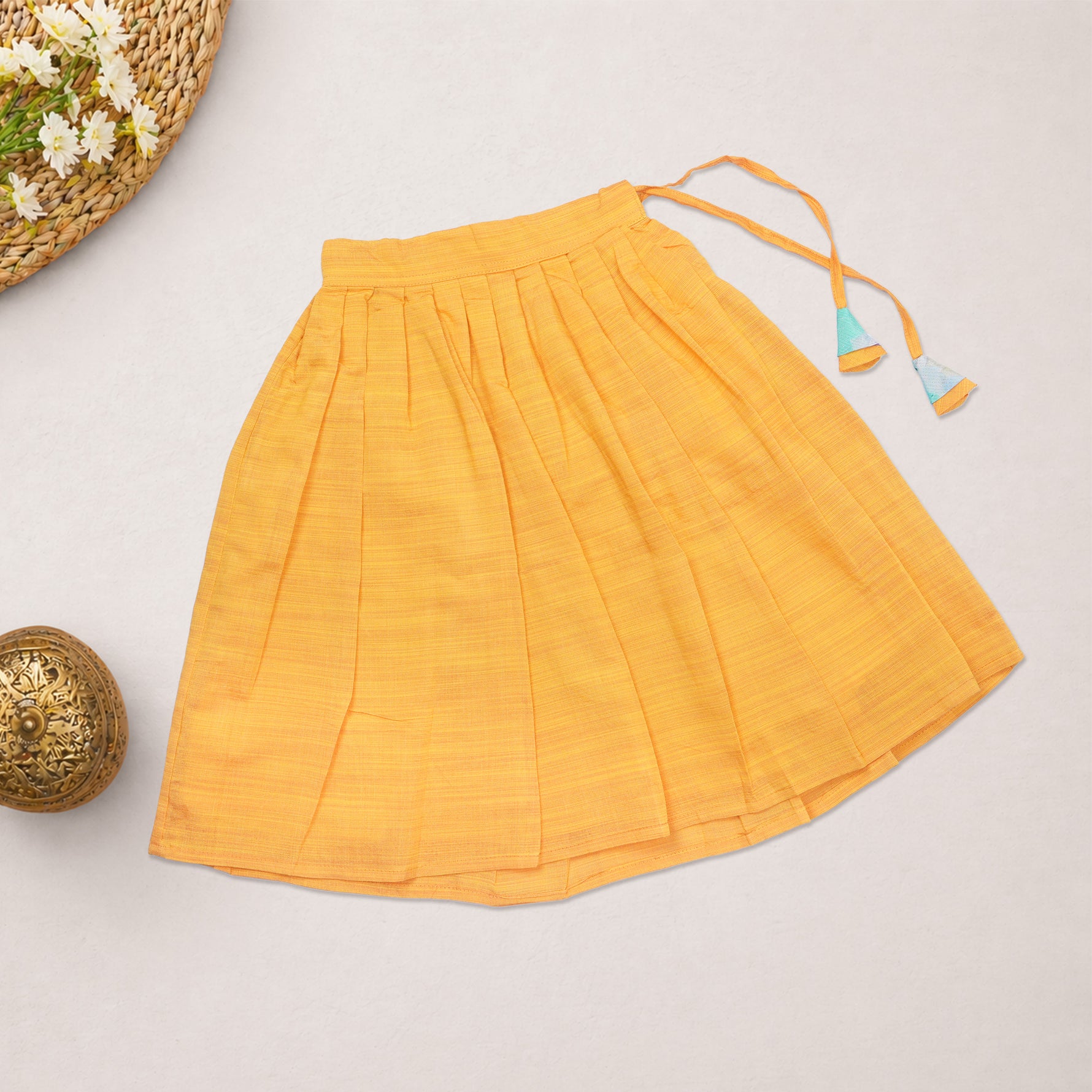 Girls floral printed ethnic top and mustard pleated skirt set by Boon Babies, featuring colorful floral design and pleated skirt.