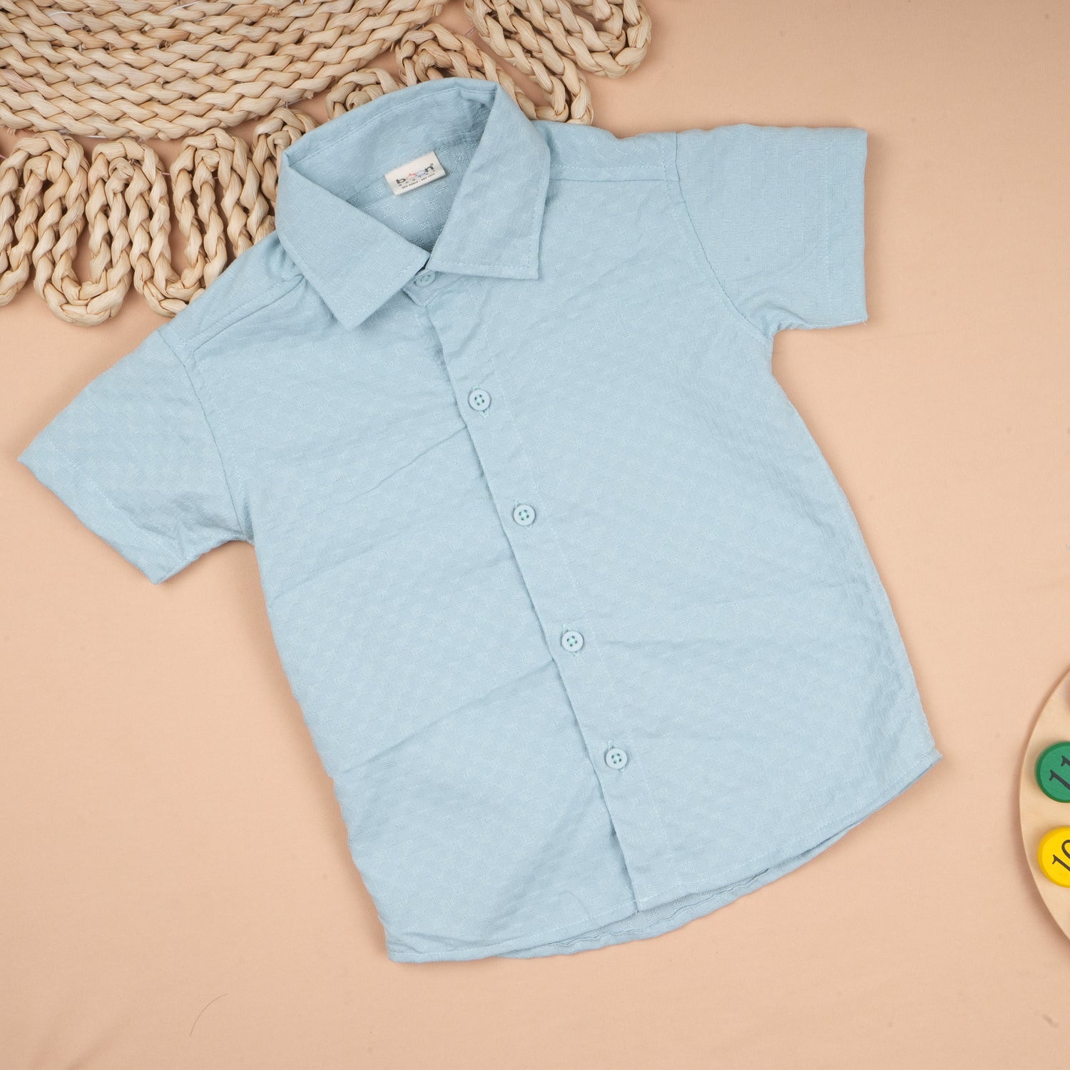 Lightweight solid popcorn shirt for boys by Boon Babies, in white with a regular collar, perfect for kids aged 6 months to 5 years.