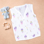 Baby wearing a soft, breathable printed muslin jabla for 0-12 months, featuring colorful patterns from Boon Babies.