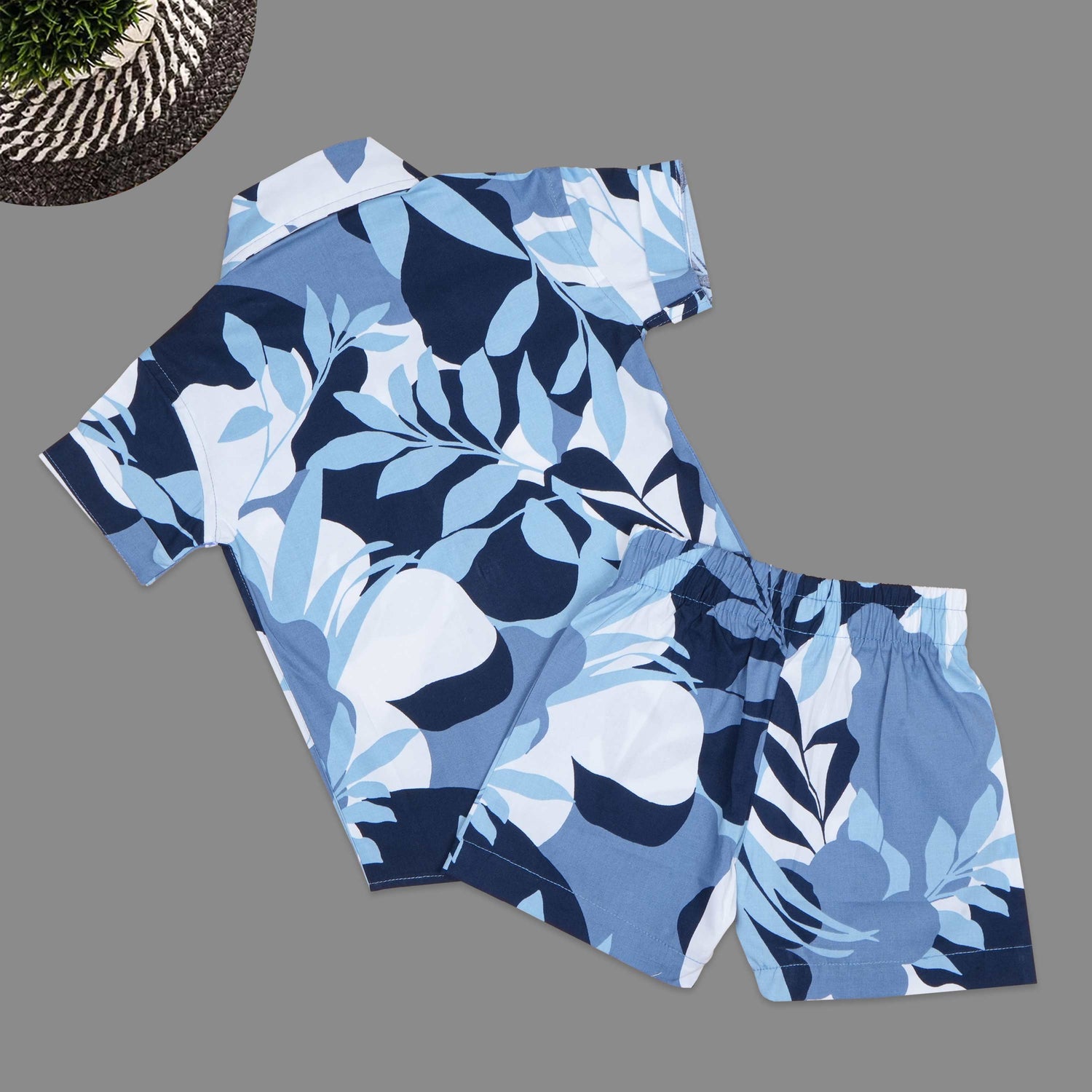 Soft cotton boys co-ord set with floral print, straight collar shirt and comfy shorts—perfect for casual style look and outdoor wear.