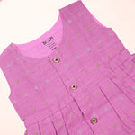 Baby girl in a pink ethnic sleeveless frock by Boon Babies, showcasing intricate embroidery and traditional design.