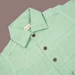 Boys mint green cotton shirt and shorts set with printed design and straight collar, by Boon Babies.