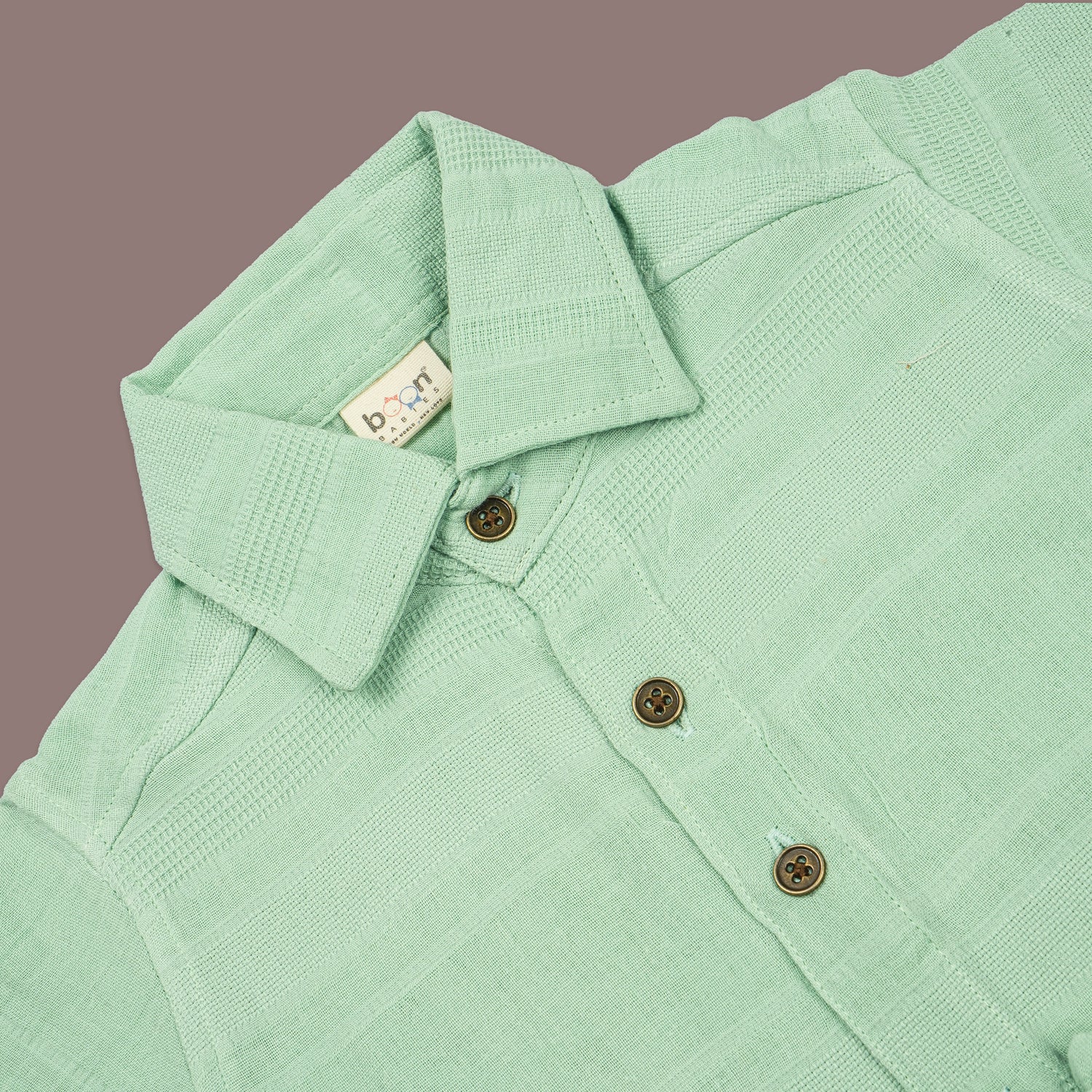 Boys mint green cotton shirt and shorts set with printed design and straight collar, by Boon Babies.