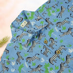 Boy wearing Boon Babies Jaipur cotton zebra print shirt and shorts with straight collar, summer casual wear.