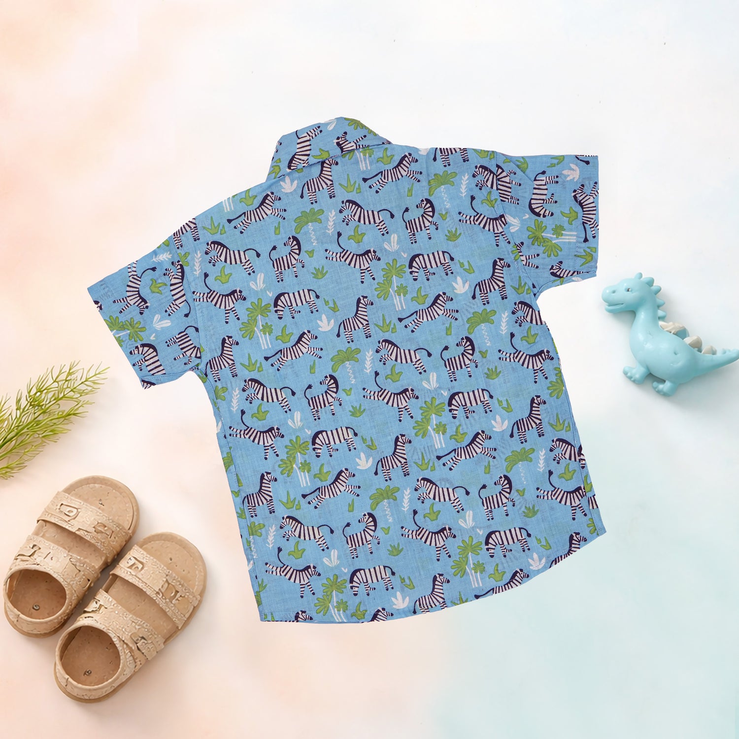 Boy wearing Jaipur Cotton zebra print shirt and shorts set by Boon Babies, featuring a straight collar for summer wear.