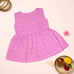 Baby girl ethnic sleeveless frock in baby pink by Boon Babies, featuring traditional embroidery and soft fabric.