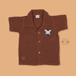 Rust brown crinkle muslin shirt and shorts set with zebra embroidery for boys – soft, breathable kidswear by Boon Babies, Coimbatore.
