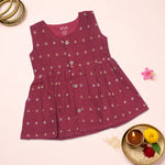 Maroon ethnic sleeveless frock for baby girls by Boon Babies, featuring traditional design and comfortable fit.