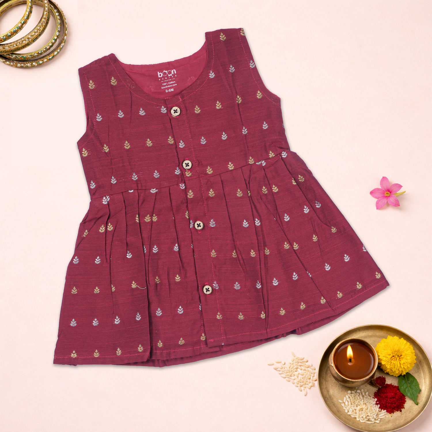 Maroon ethnic sleeveless frock for baby girls by Boon Babies, featuring traditional design and comfortable fit.
