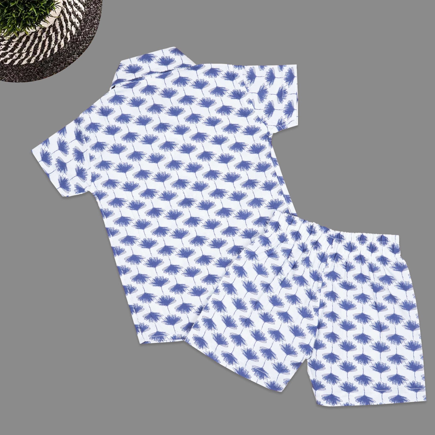 Soft cotton boys co-ord set with blue floral print, straight collar shirt and comfy shorts—perfect for casual style look and outdoor wear.