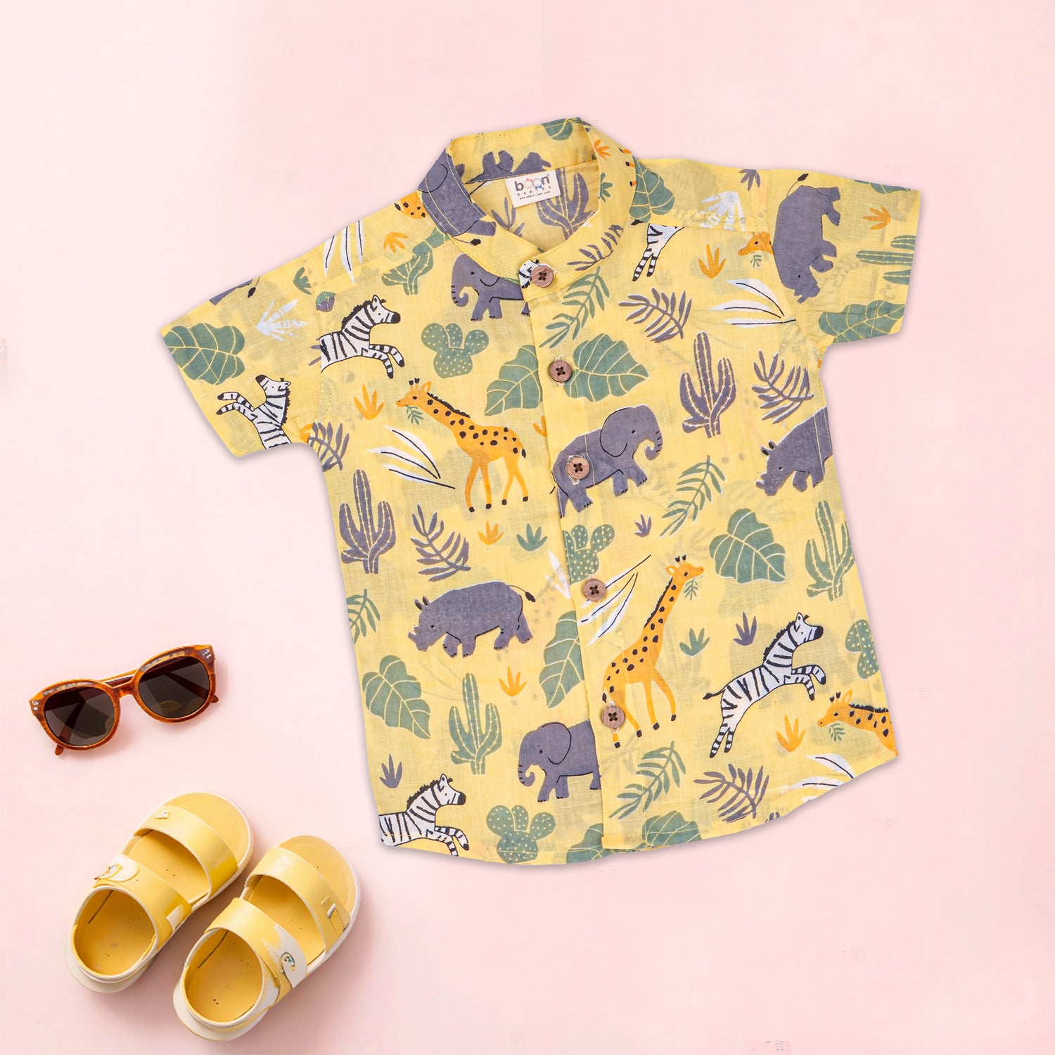 Boon Babies boys safari jungle print co-ord set with Chinese collar, featuring matching shirt and shorts with jungle motif.
