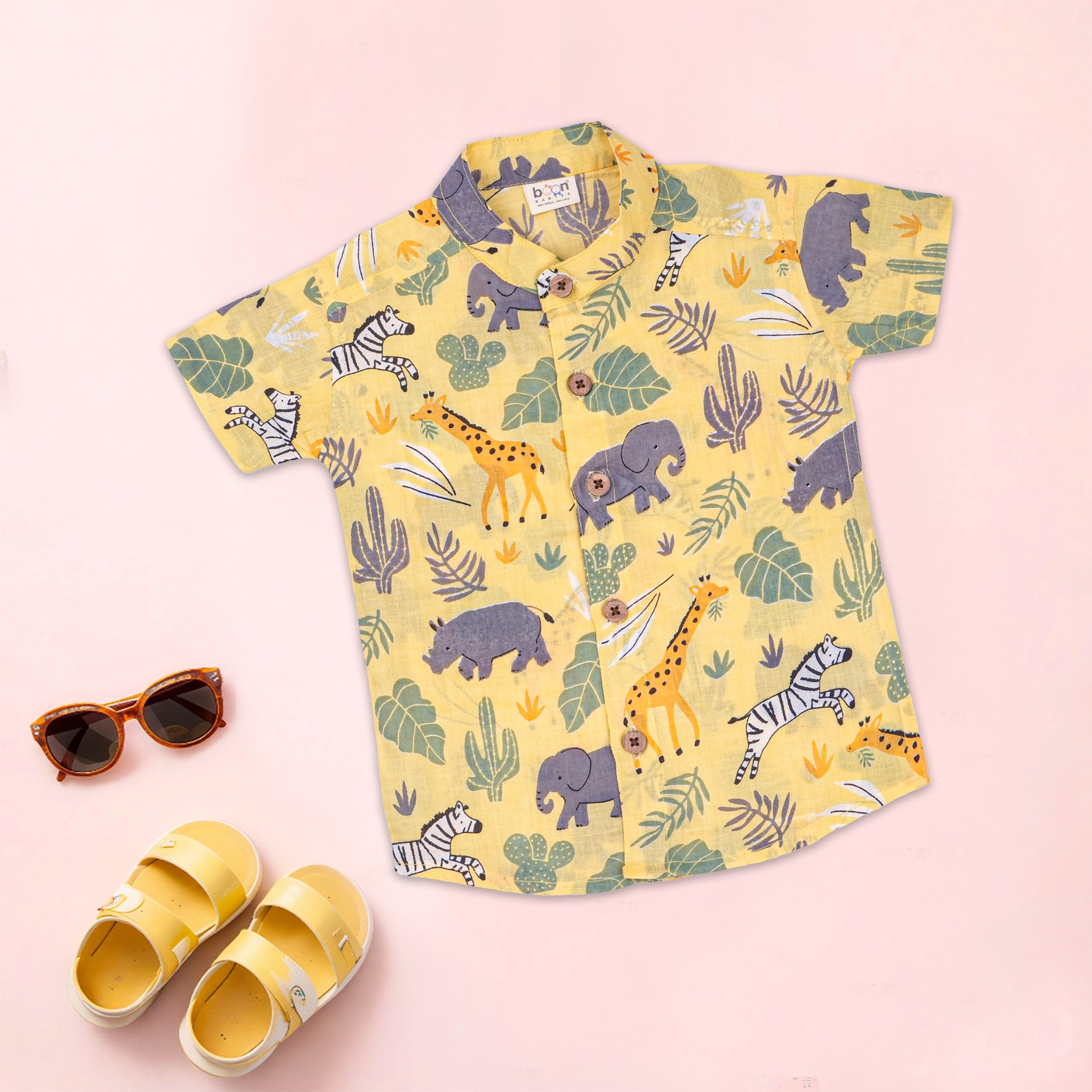 Boon Babies boys safari jungle print co-ord set with Chinese collar, featuring matching shirt and shorts with jungle motif.