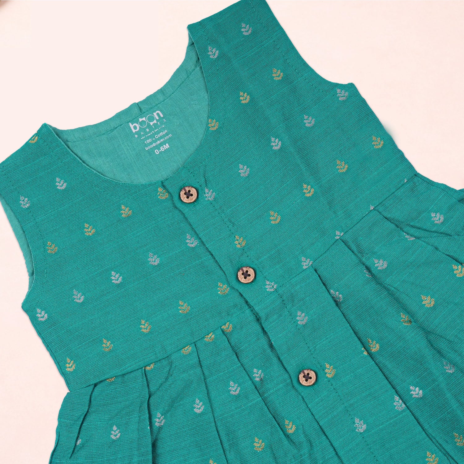 Sea green Boon Babies ethnic sleeveless frock for baby girls, featuring traditional design and comfortable fabric.