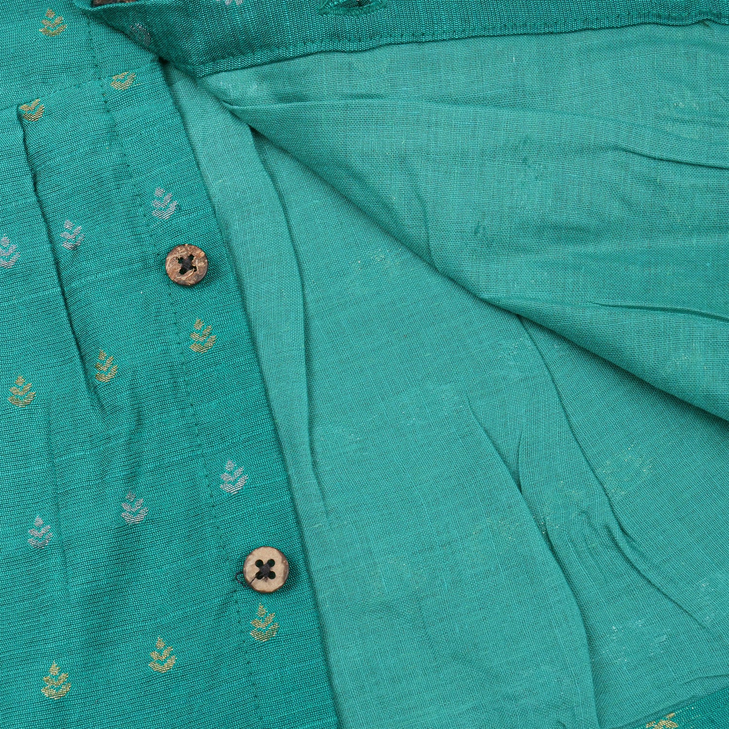 Sea green ethnic sleeveless baby girl frock by Boon Babies, featuring intricate embroidery and a comfortable fit.