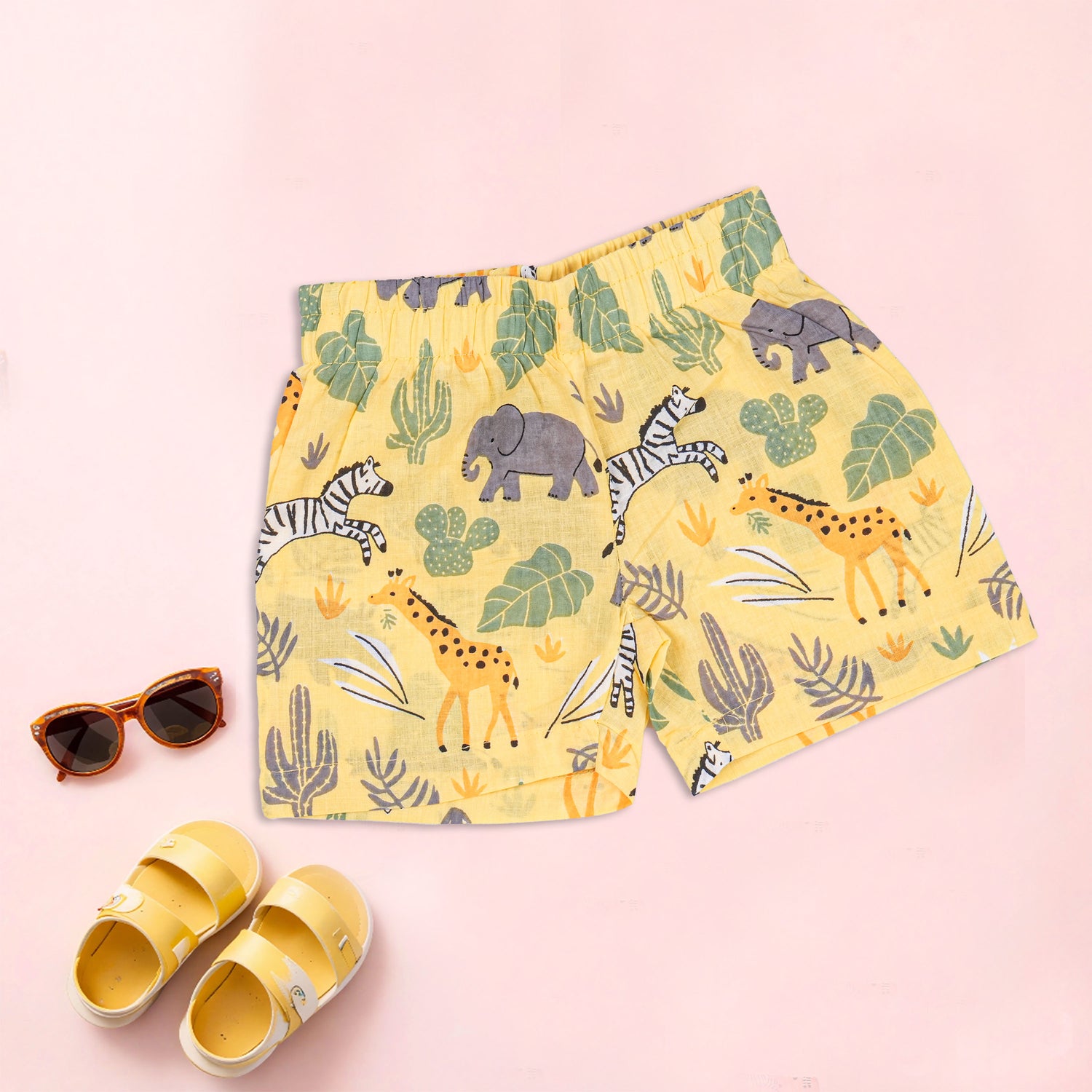 Boon Babies boys safari jungle print co-ord set featuring a printed shirt with Chinese collar and matching shorts.