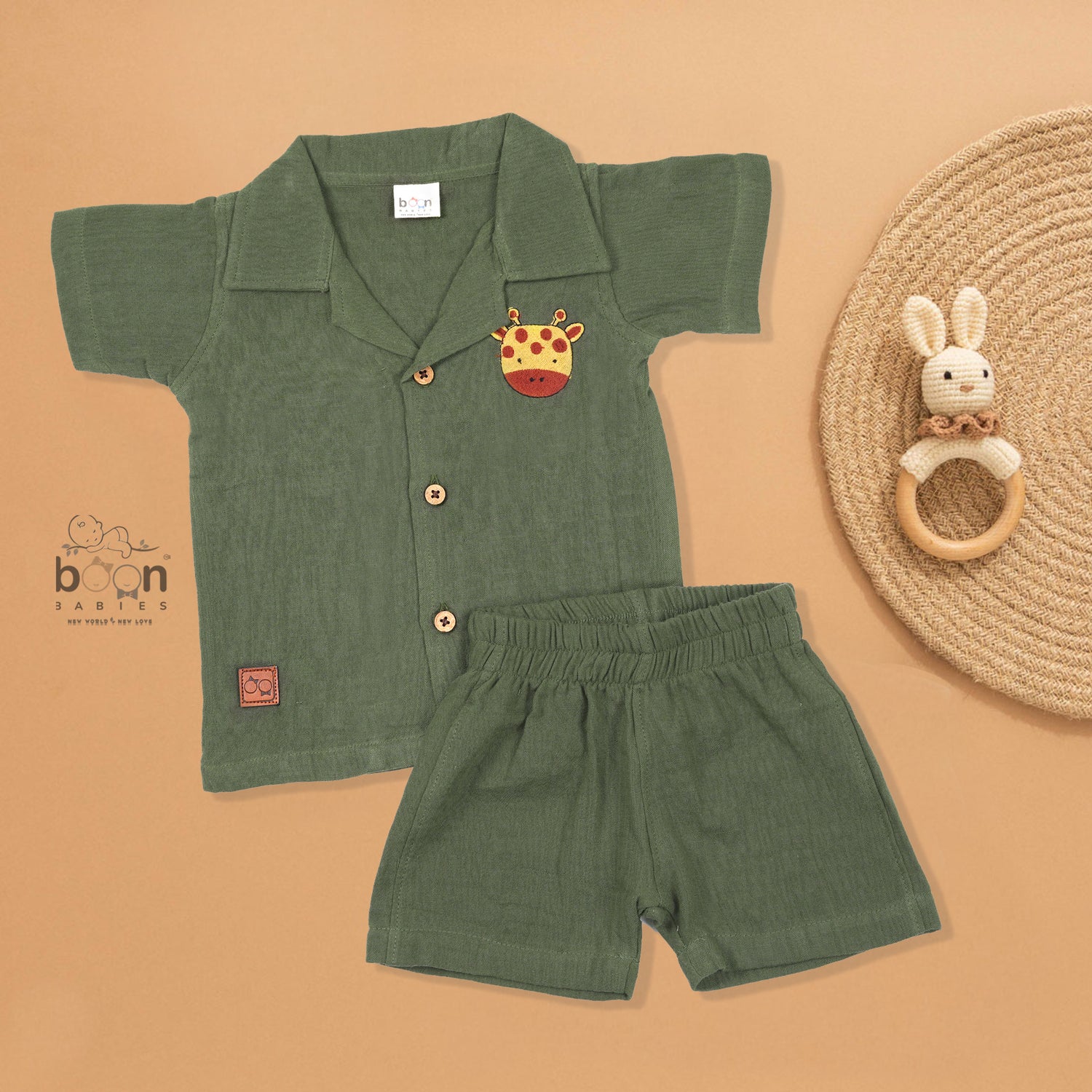 Olive green crinkle muslin shirt and shorts set with giraffe embroidery for boys aged 12M–5Y – a soft, breathable outfit by Boon Babies in Coimbatore.
