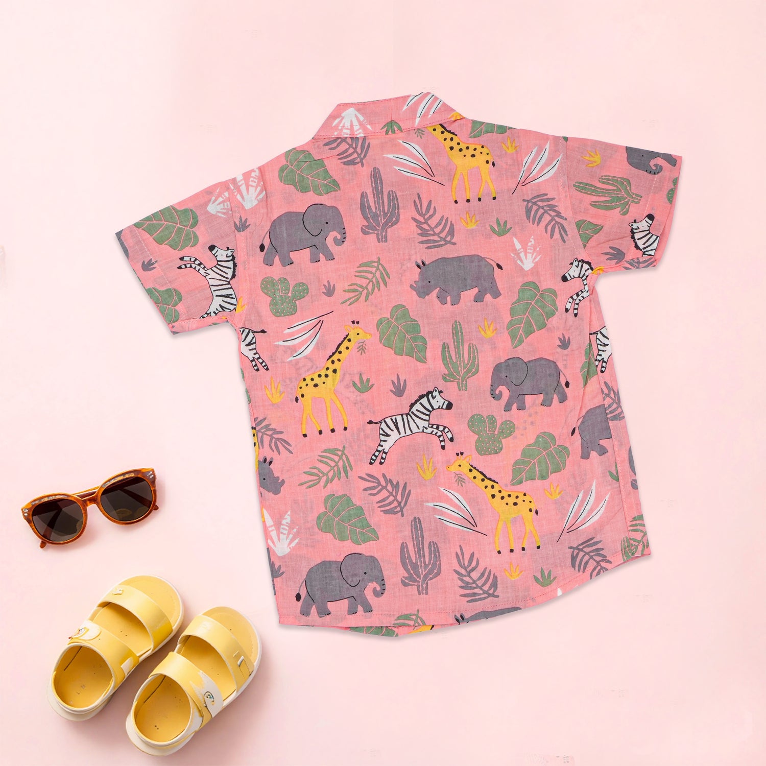 Pink safari print boys co-ord set from Boon Babies, featuring a printed shirt with Chinese collar and matching shorts.