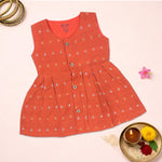 Baby girl ethnic sleeveless frock in bright orange by Boon Babies, featuring traditional design and comfortable fit for special occasions.