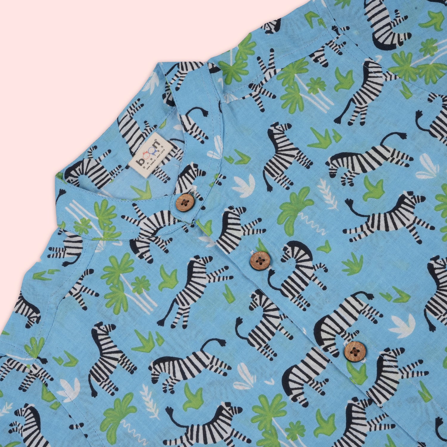 Blue zebra print boys co-ord set with a printed Chinese collar shirt and matching shorts by Boon Babies.