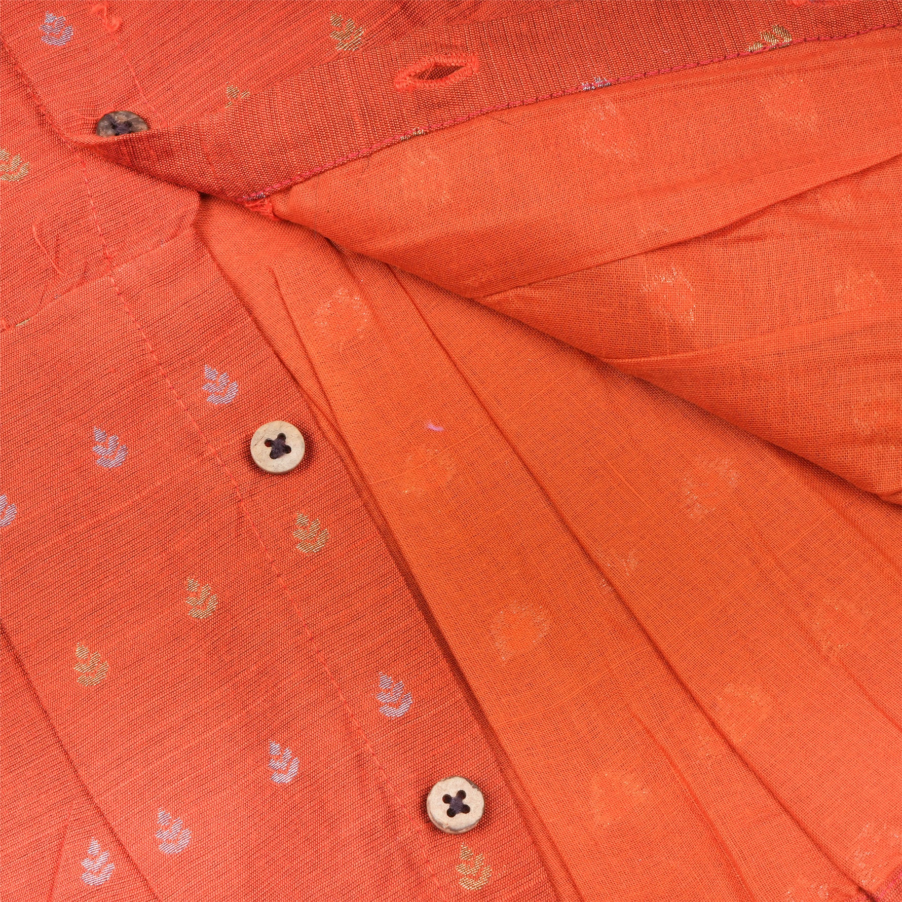 Orange ethnic sleeveless frock for baby girls by Boon Babies, featuring traditional design and comfortable fabric.