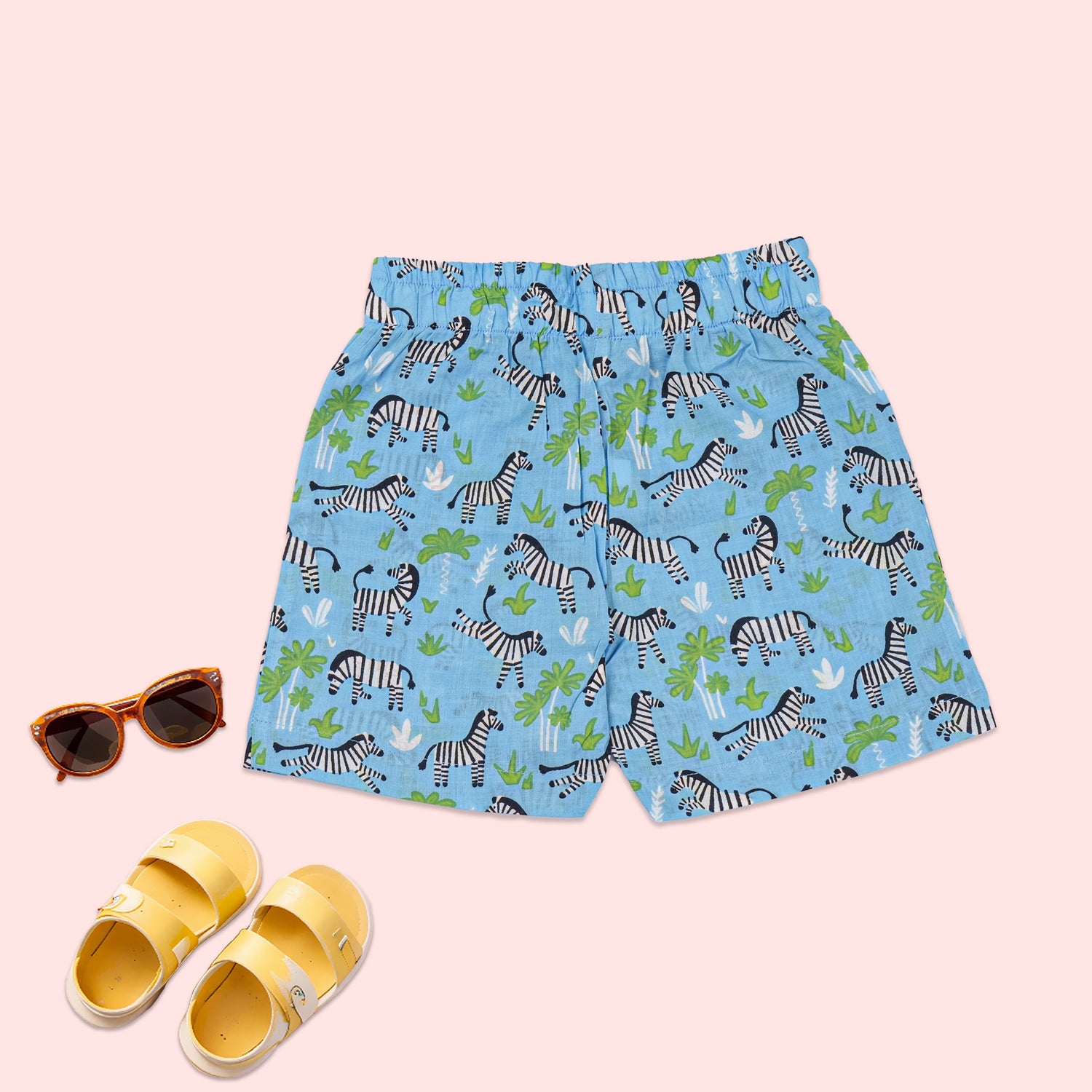 Blue zebra print boys co-ord set from Boon Babies with a printed shirt and shorts featuring a Chinese collar.