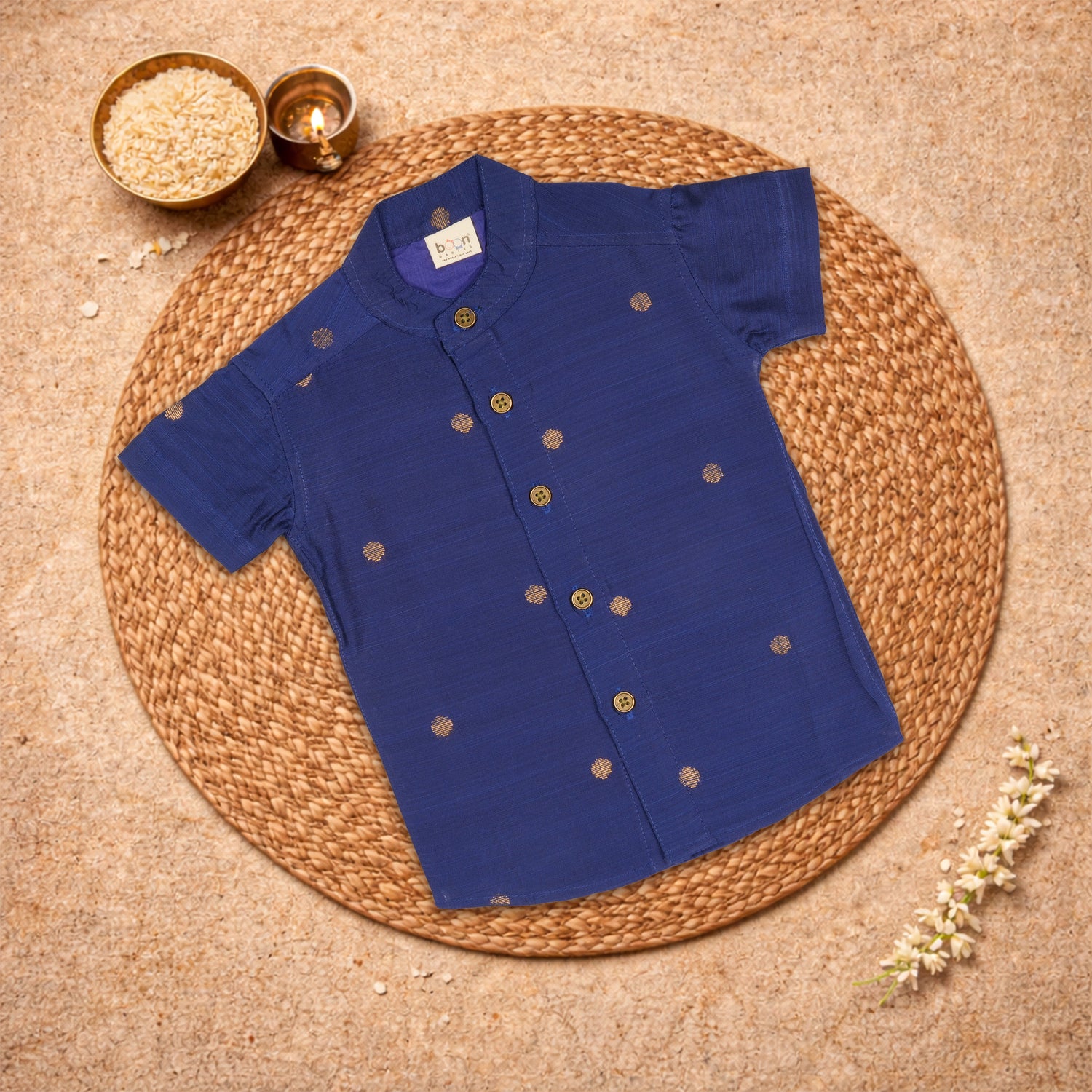 Boys royal blue silk butta ethnic shirt and dhoti set by Booon Babies, traditional Indian boys' ethnic wear with intricate details.