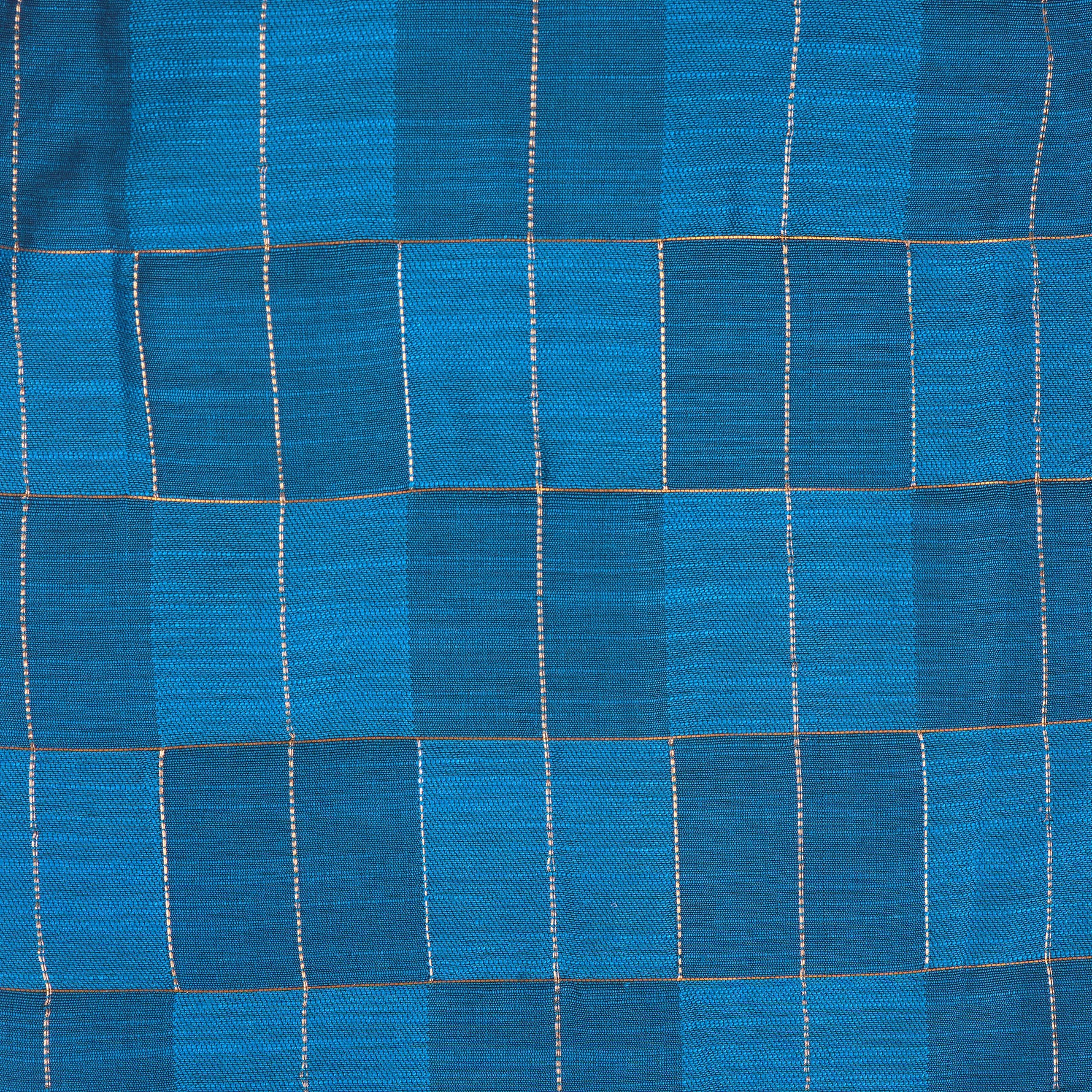 Royal blue silk shirt with golden check pattern, neatly folded beside a traditional white veshti – premium festive shirt for baby boys by Boon Babies, Coimbatore.