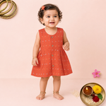 Orange ethnic sleeveless frock for baby girls by Boon Babies, featuring traditional design and comfortable fabric.