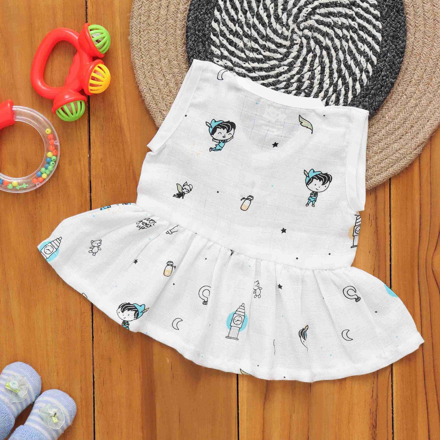 Whimsical Wonders: Cute Printed Muslin Frock for Infants