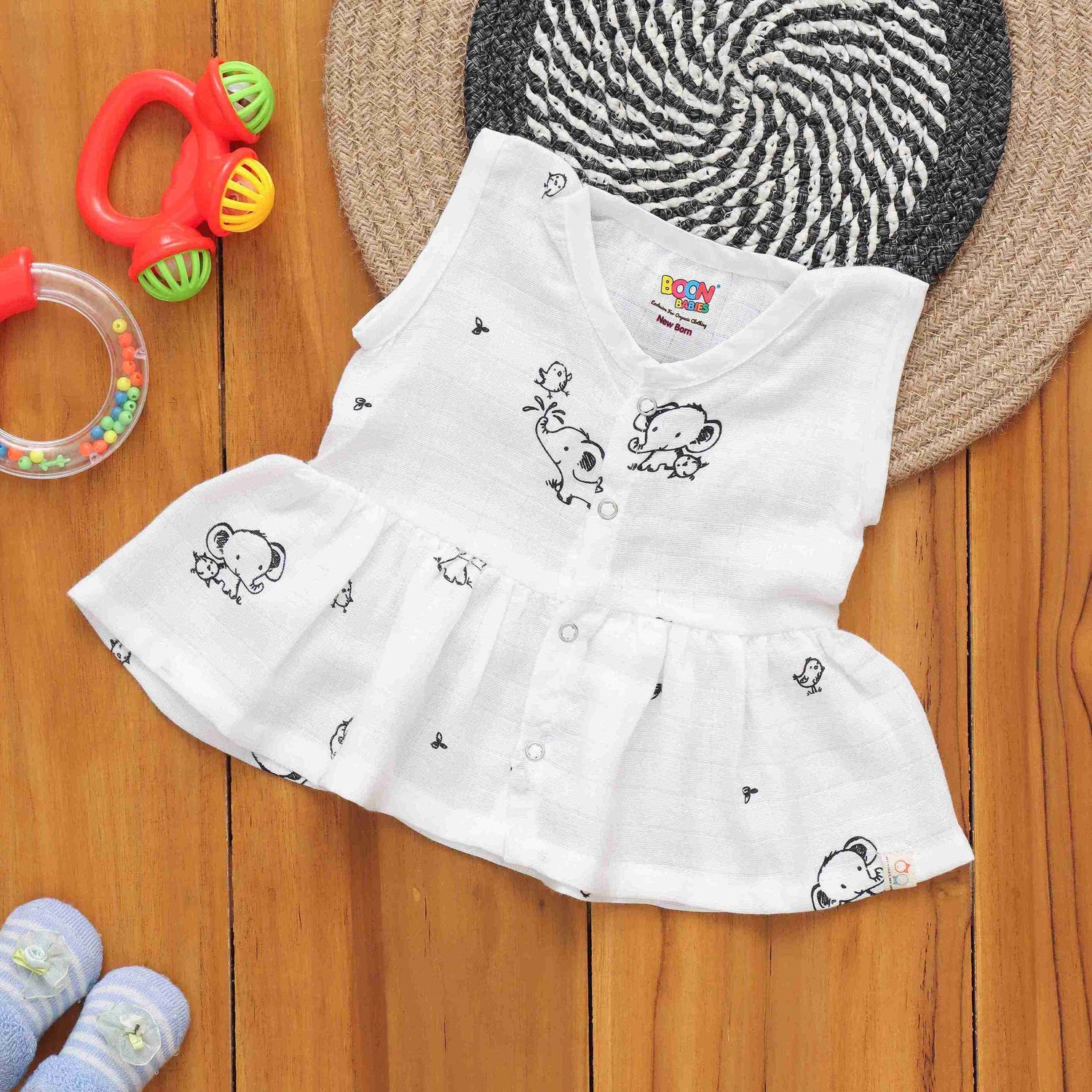 Whimsical Wonders: Cute Printed Muslin Frock for Infants