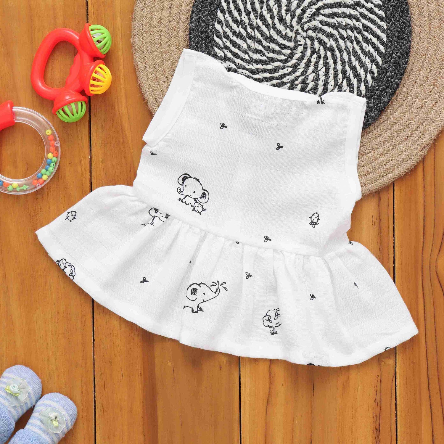 Whimsical Wonders: Cute Printed Muslin Frock for Infants