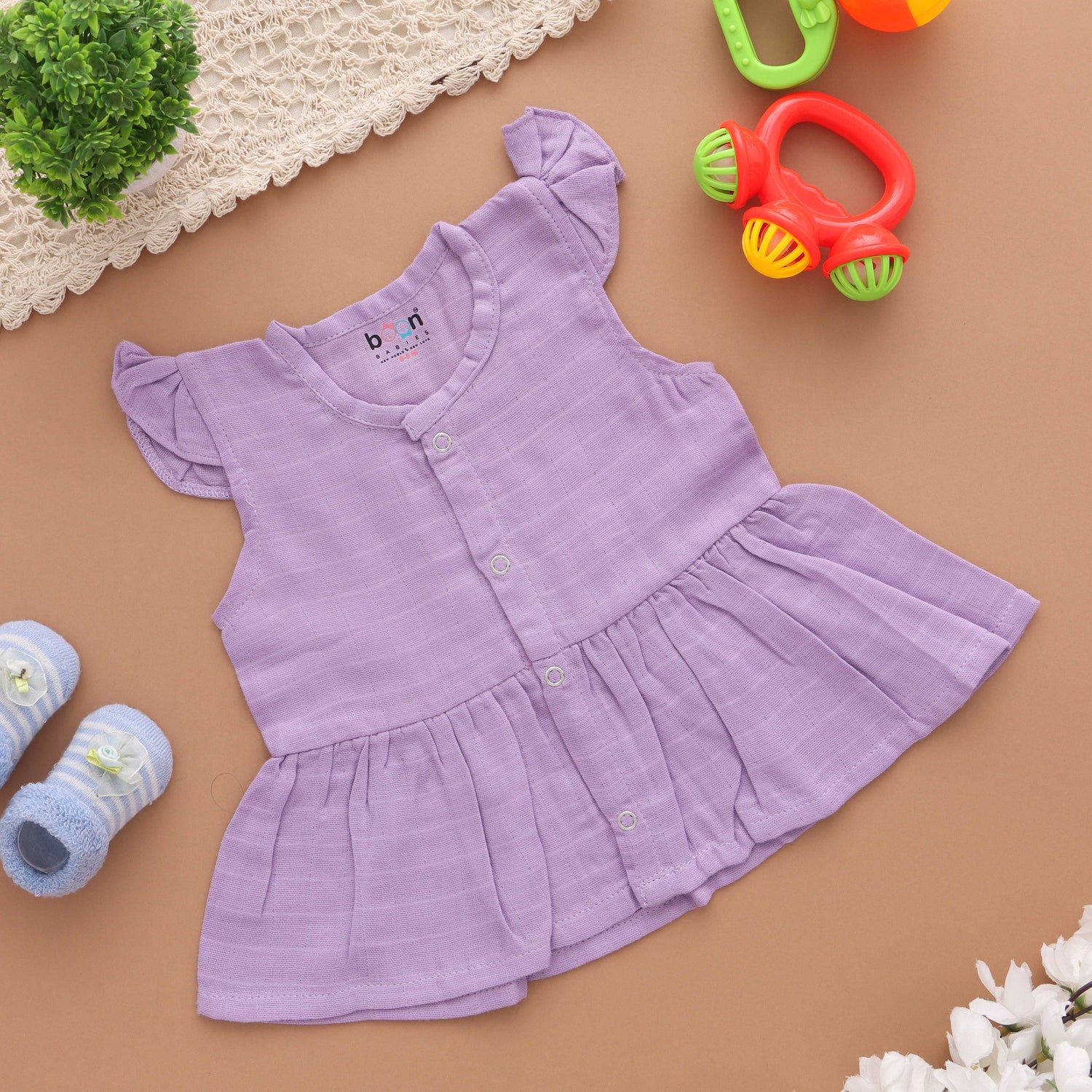 First Wardrobe: Essential Solid Colored Muslin Frock for Babies