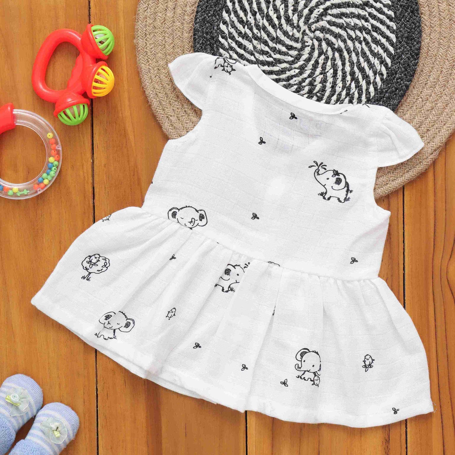 Dreamy Doodles: Cute Patterned Muslin Frock for Infants