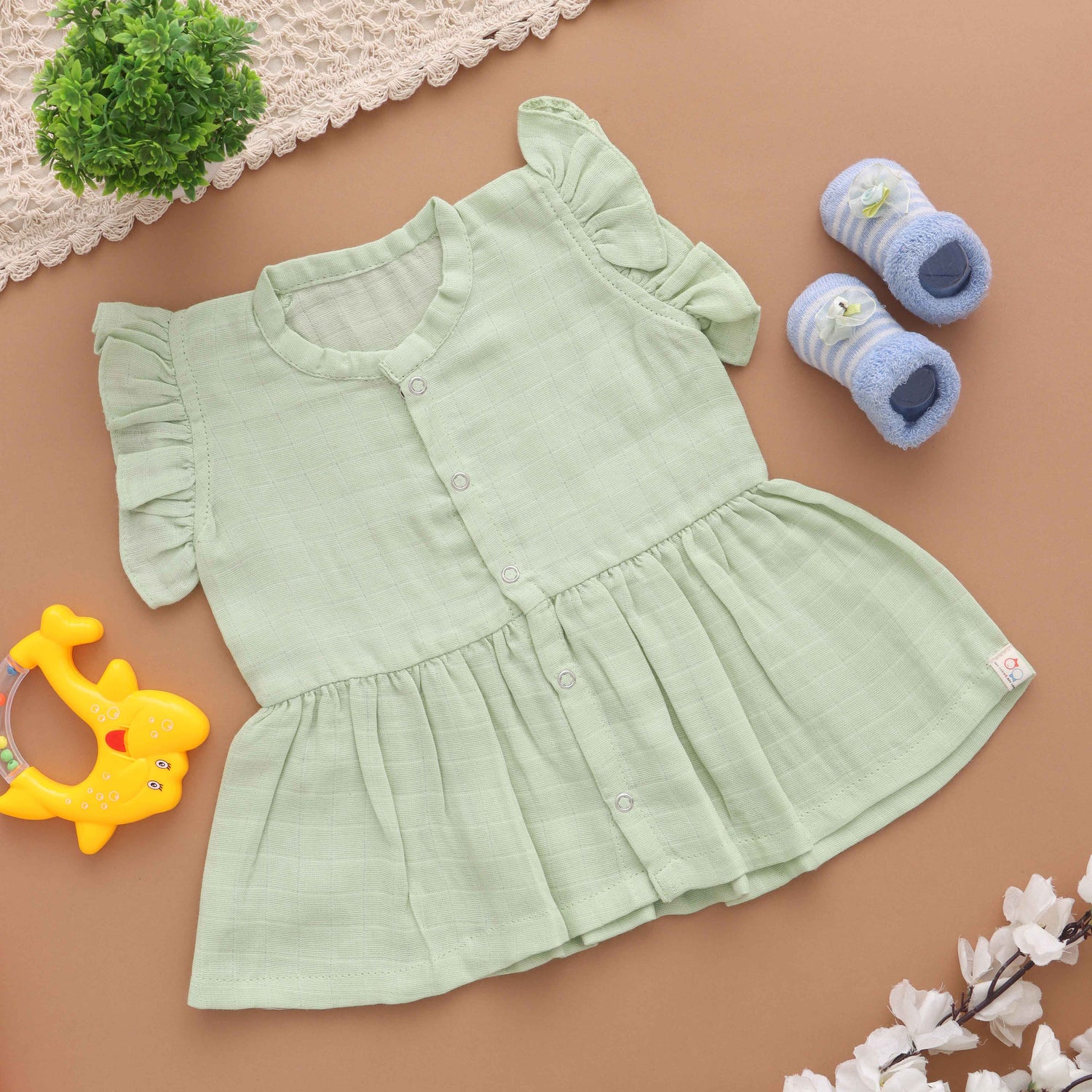 Simplicity Chic: Elegant Solid Muslin Dress for Newborn Babies