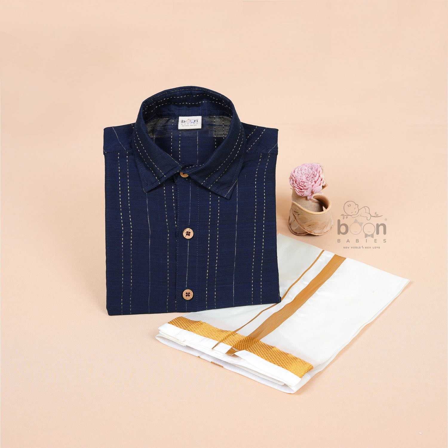 Navy blue silk shirt and ivory gold-bordered dhoti set for boys aged 12M to 5Y – traditional festive babywear combo from Boon Babies, Coimbatore.
