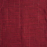 Maroon silk shirt with vertical golden lines, folded next to a traditional white veshti – boys' festive ethnic shirt by Boon Babies, Coimbatore.